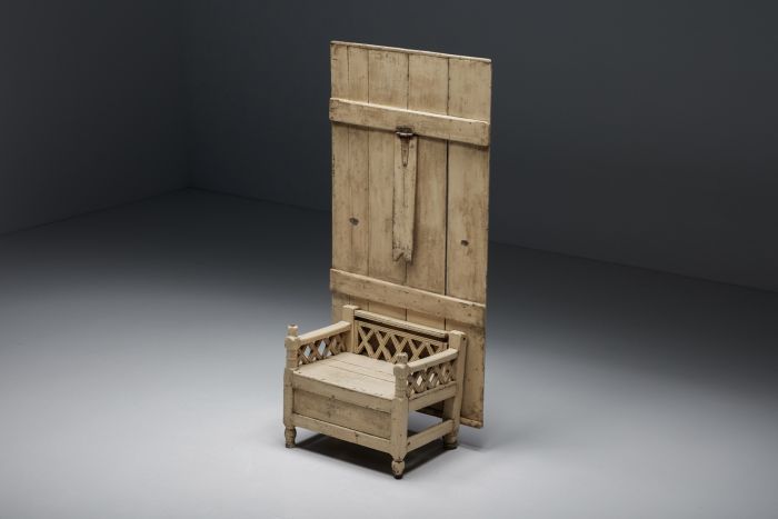 Irish wooden settle chair from the nineteenth century