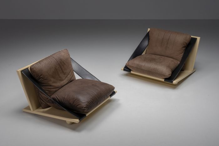 Lounge chairs in lacquer and leather from the 1970s