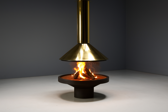 Mid century freestanding brass fireplace dating to 1975