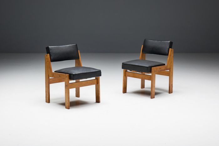 Modernist chairs by Wim den Boon in oak and vinyl from the 1950s