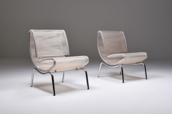Post modern easy chairs in chrome and plastic wire from the 1960s