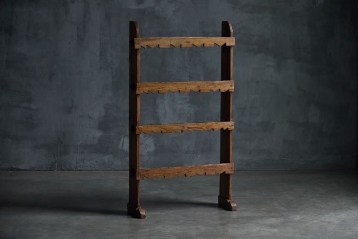 Primitive rustic bookcase from the 19th century in solid wood