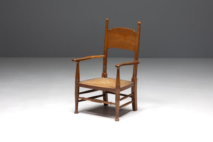 Rustic armchair in solid oak and straw from the 1900s