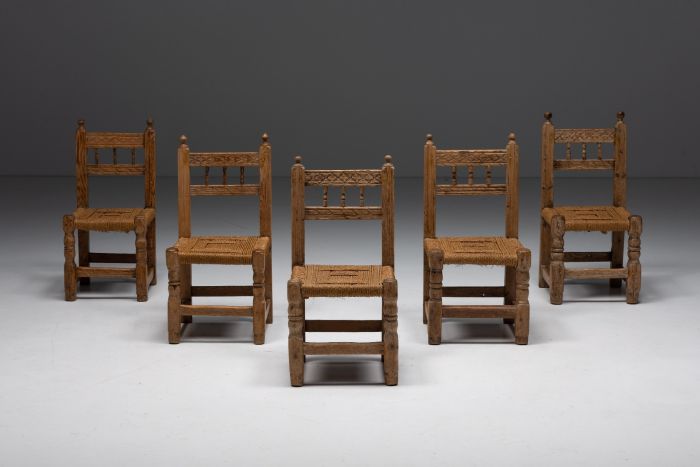 Rustic straw dining chairs from the nineteenth century