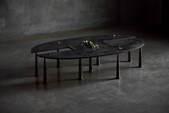 Brutalist iron coffee table with mineral inclusions designed by Thomas Serruys in 2019
