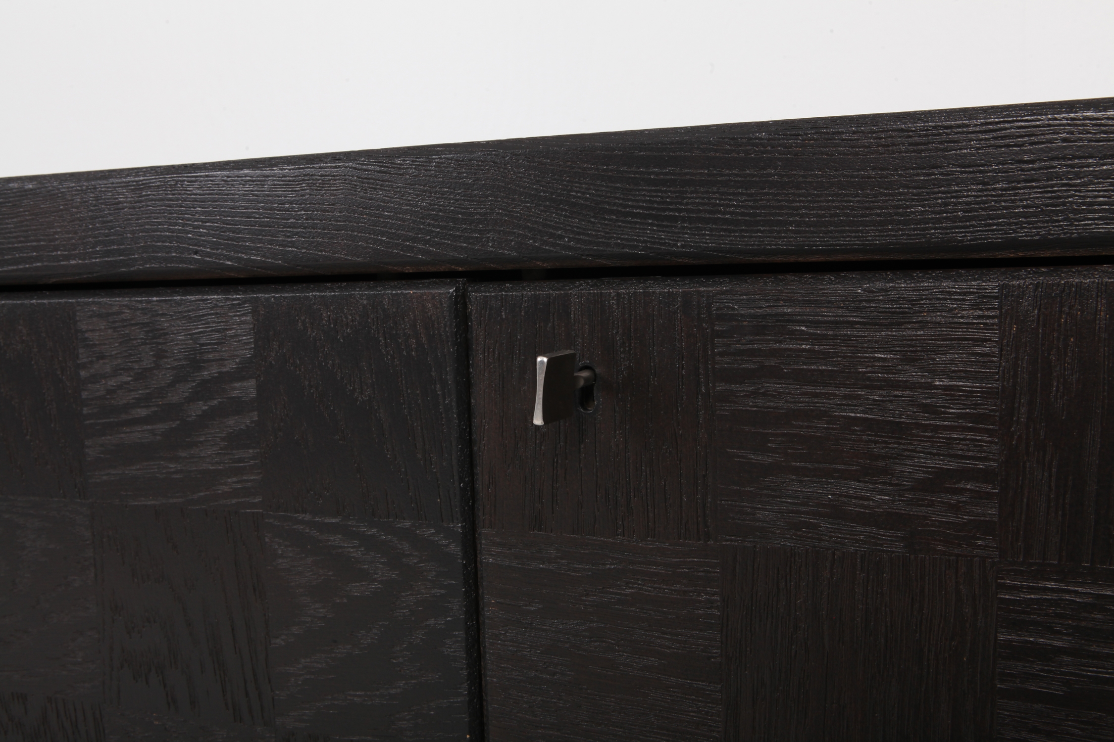 Brutalist Floating Credenza in Stained Oak with Geometric Doors by De Coene - 1970s