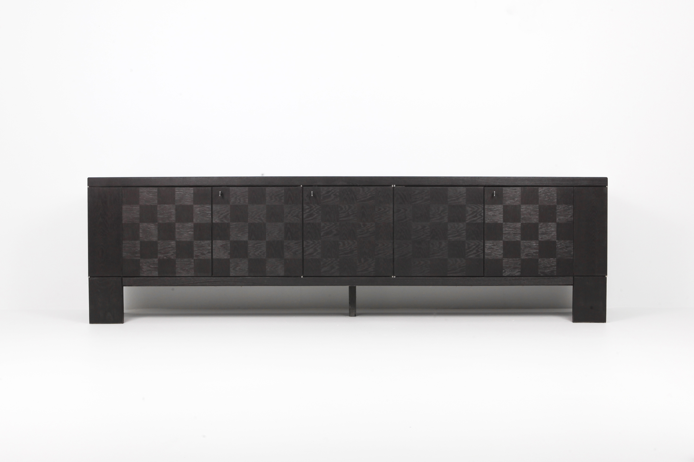 Brutalist Floating Credenza in Stained Oak with Geometric Doors by De Coene - 1970s