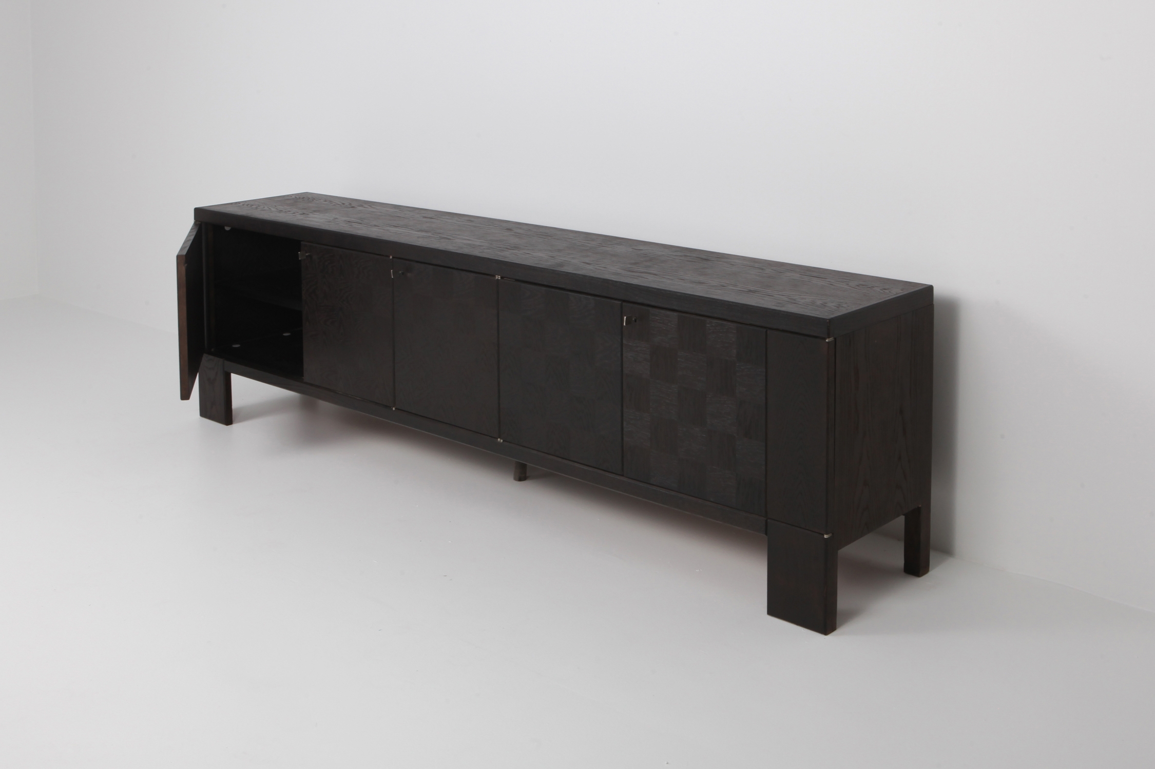 Brutalist Floating Credenza in Stained Oak with Geometric Doors by De Coene - 1970s