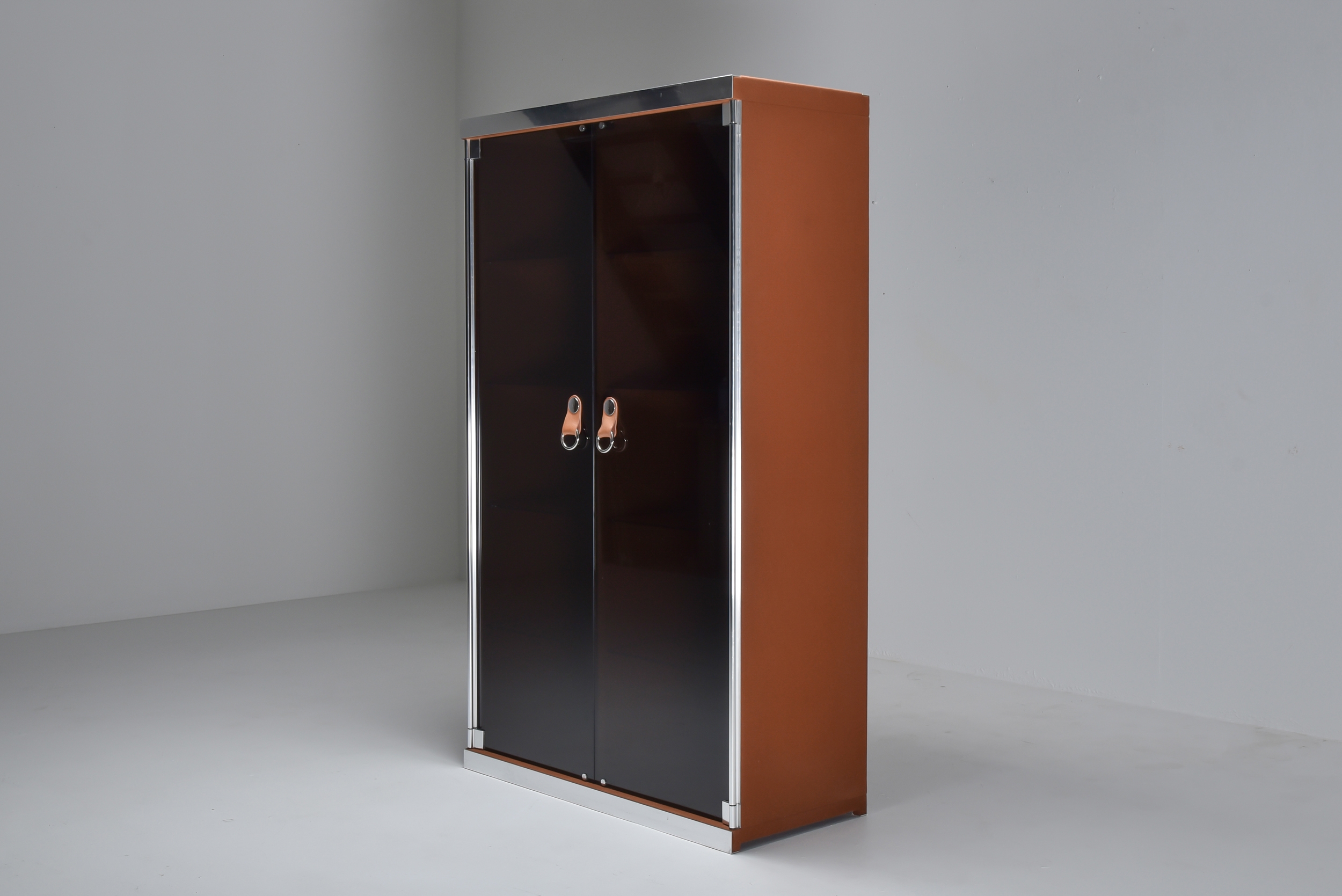 Italian design dresser in cognac leather, chrome and black glass for Hermès - 1970s
