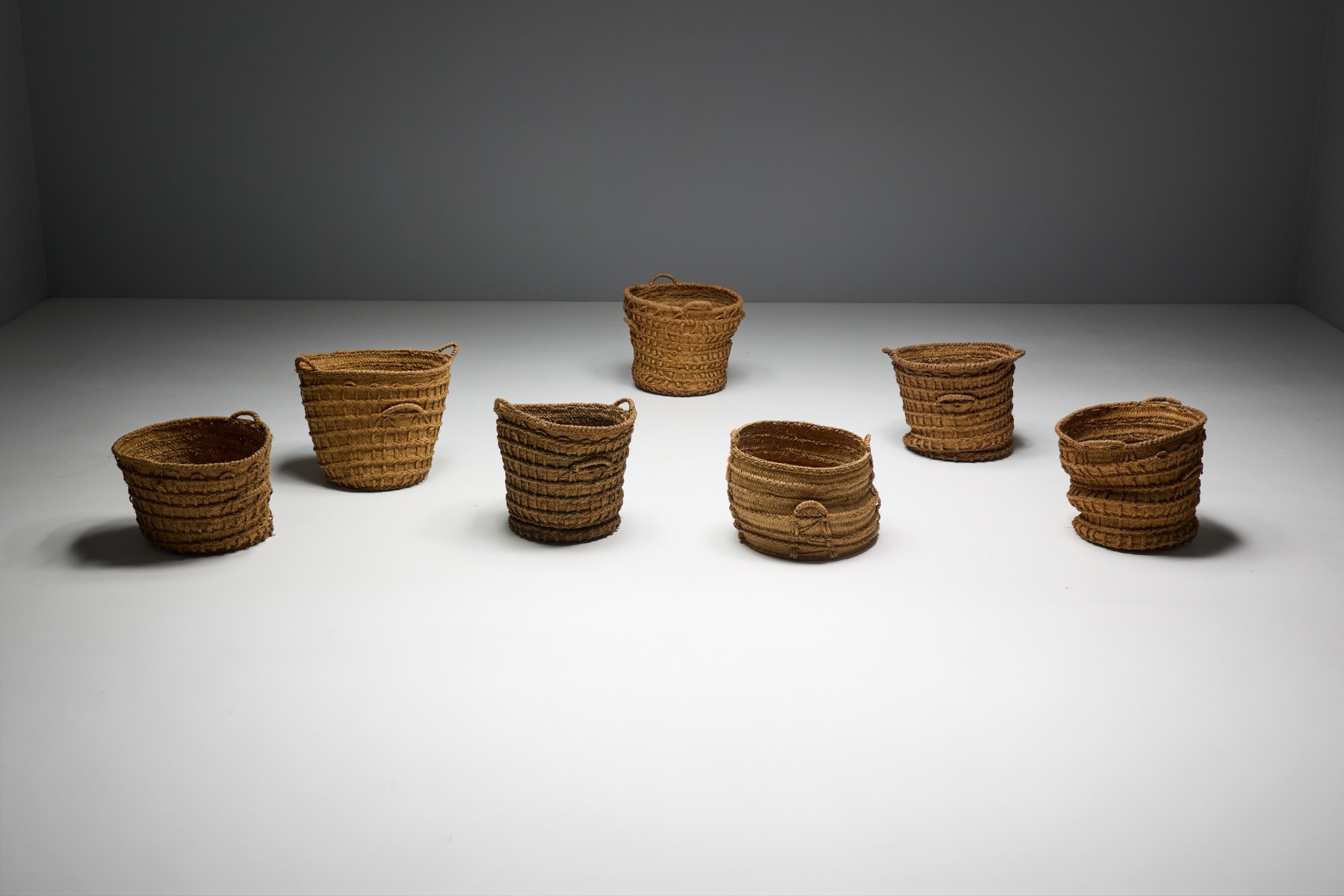 Primitive oversized basket with handwoven construction