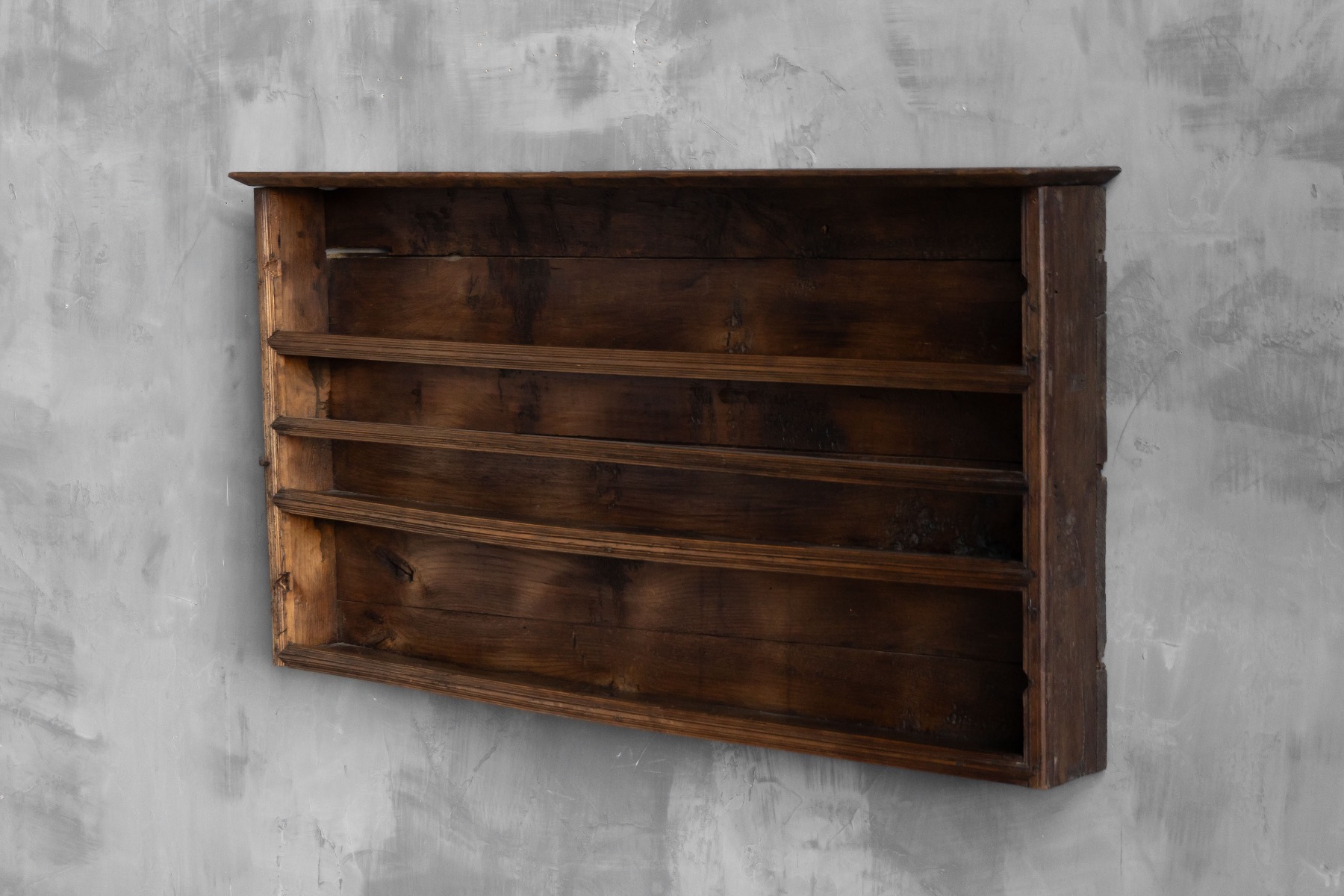 Solid wood vernacular wall shelf for functional storage, France, 19th century